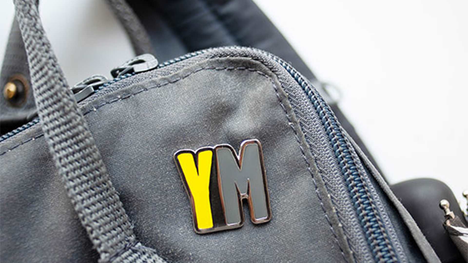 YoungMinds pin badge on bag