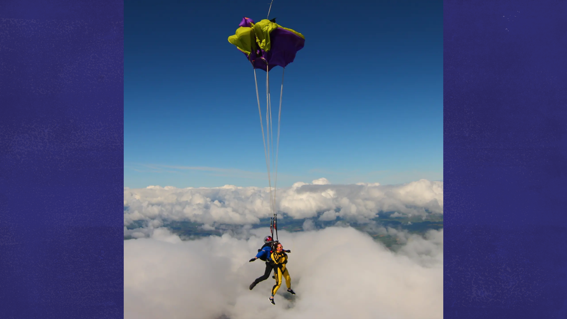 Our fundraiser Laura towards the end of the skydive with a parachute open.