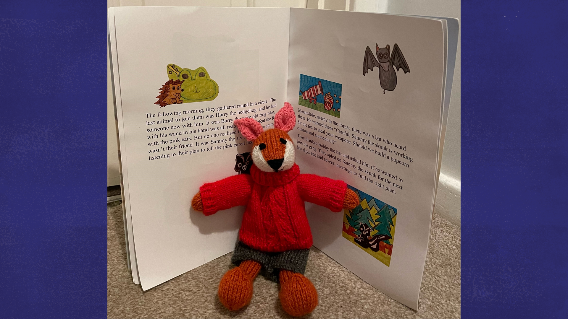 Class 6CJ's book open with a toy fox in front of it.