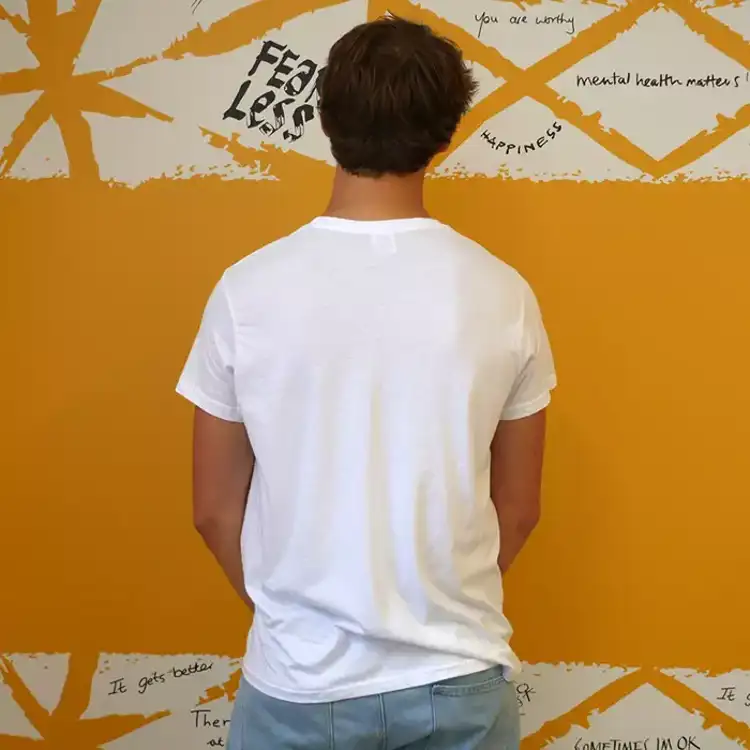 The back of our David Oku Hello Yellow T-shirt in plain white.