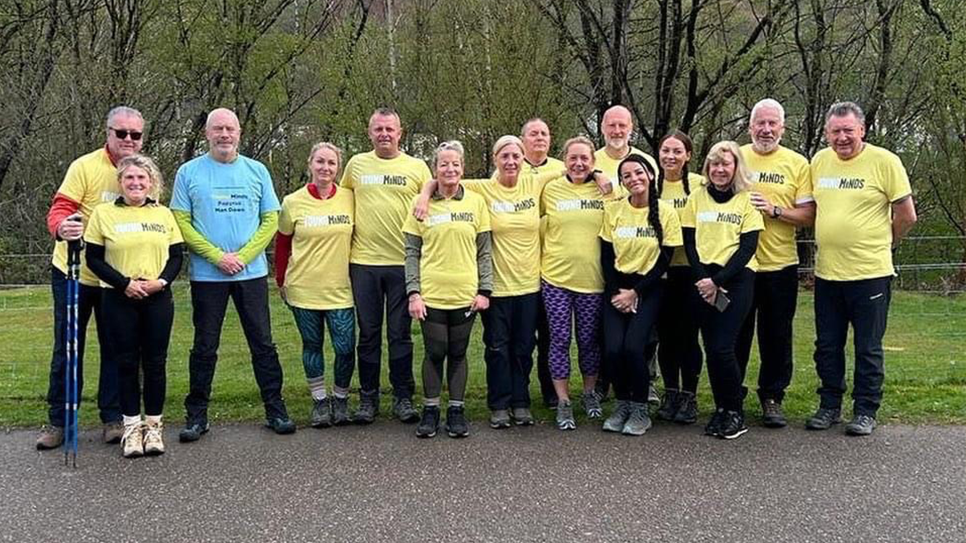A group picture of 4 Families Walking all in YoungMinds t-shirts.